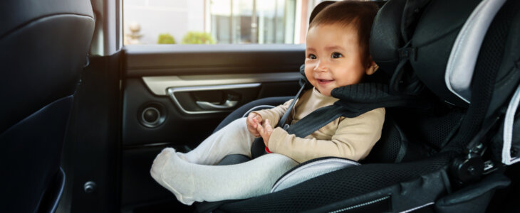 Young child sitting in a car seat