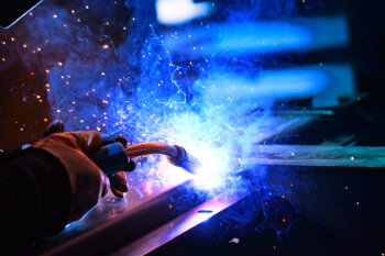 Blue welding sparks.